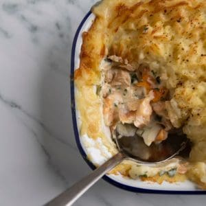 A freshly baked fish pie with golden crust.