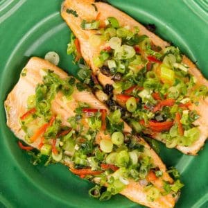 Cooked trout fillet stuffed with spring greens.