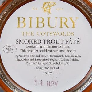 Jar of smoked trout fillets.